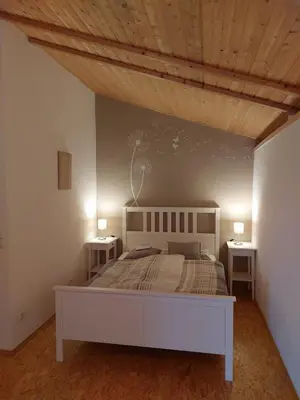 Ein Bett oder Betten in einem Zimmer der Unterkunft Casa Andrea, Ferienwohnung