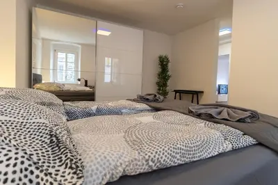 Ein Bett oder Betten in einem Zimmer der Unterkunft Fewomo - Moseltraum ! Exklusive Unterkunft für Genießer - Nah am Schloss