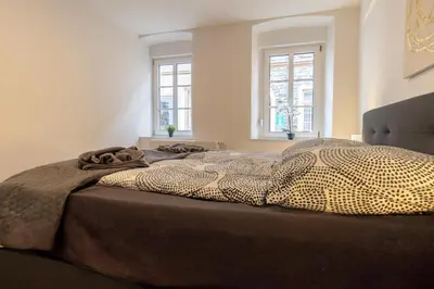 Ein Bett oder Betten in einem Zimmer der Unterkunft Fewomo - Moseltraum ! Exklusive Unterkunft für Genießer - Nah am Schloss