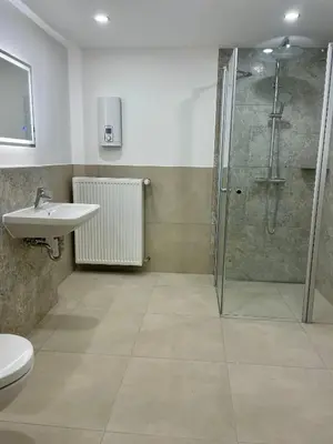 Ein Badezimmer in der Unterkunft Ferienhaus Eifelgruß, in schöner Waldrandlage und tollem Naturgarten