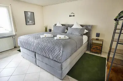 Ein Bett oder Betten in einem Zimmer der Unterkunft Apartment bei Nürburgring, Parking, Homeoffice