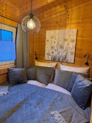 Ein Bett oder Betten in einem Zimmer der Unterkunft EifelChalet Niederehe