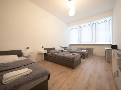 Ein Bett oder Betten in einem Zimmer der Unterkunft Zentrale Unterkunft Nähe Hbf