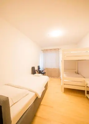 Ein Bett oder Betten in einem Zimmer der Unterkunft Zentrale Unterkunft Nähe Hbf