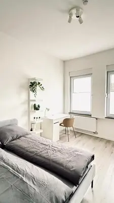 Ein Bett oder Betten in einem Zimmer der Unterkunft Suite Hilde
