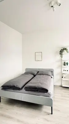 Ein Bett oder Betten in einem Zimmer der Unterkunft Suite Hilde