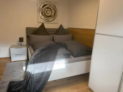 Ein Bett oder Betten in einem Zimmer der Unterkunft Casa Clara - Exklusive Ferienwohnung