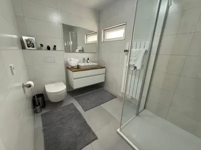 Ein Badezimmer in der Unterkunft Casa Clara - Exklusive Ferienwohnung