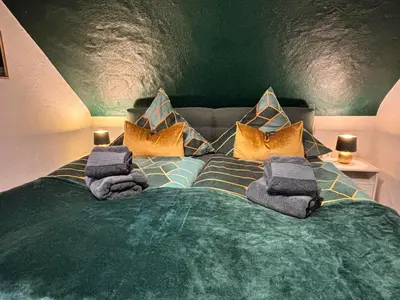 Ein Bett oder Betten in einem Zimmer der Unterkunft harmony holiday, Pension