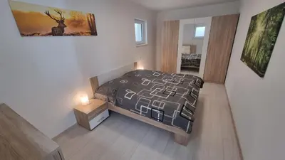 Ein Bett oder Betten in einem Zimmer der Unterkunft Ferienwohnung Zum Pflanzgarten