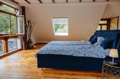 Ein Bett oder Betten in einem Zimmer der Unterkunft Außerhalb2 - Chalet Wassermühle