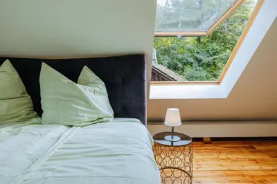 Ein Bett oder Betten in einem Zimmer der Unterkunft Außerhalb2 - Chalet Wassermühle