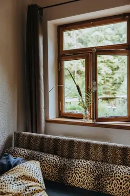 Ein Bett oder Betten in einem Zimmer der Unterkunft Außerhalb2 - Chalet Wassermühle