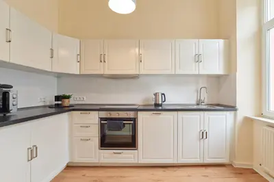 Küche/Küchenzeile in der Unterkunft MARX - Geräumige Ferienwohnung im Zentrum von Trier - bis 6 Personen, 2 Schlafzimmer, WLAN & Waschmaschine