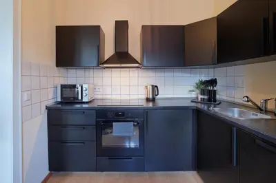 Küche/Küchenzeile in der Unterkunft MARX - Zentrales & geräumiges Apartment für bis zu 6 Personen - 2 Schlafzimmer mit TV, WLAN & Waschmaschine