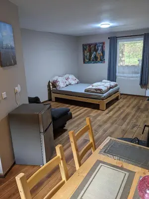 Ein Bett oder Betten in einem Zimmer der Unterkunft Kleine Wohnung am waldrand