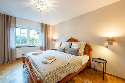 Ein Bett oder Betten in einem Zimmer der Unterkunft Reet am Rhein - Chateau