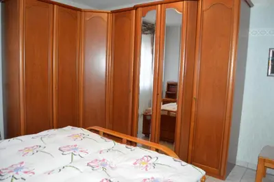 Ein Bett oder Betten in einem Zimmer der Unterkunft Ferienwohnung am Park - Vulkanferien