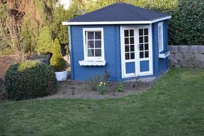 Ein Garten an der Unterkunft Ferienwohnung am Park - Vulkanferien