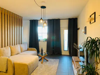 Ein Sitzbereich in der Unterkunft Ferienwohnung Auszeit