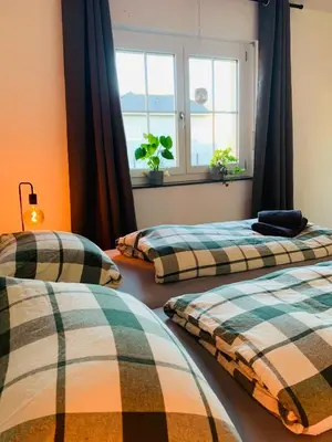 Ein Bett oder Betten in einem Zimmer der Unterkunft Ferienwohnung Auszeit