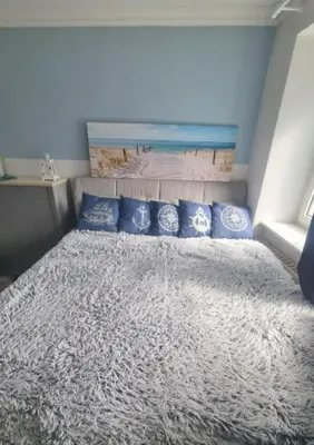 Ein Bett oder Betten in einem Zimmer der Unterkunft Vacation home Moselsteg