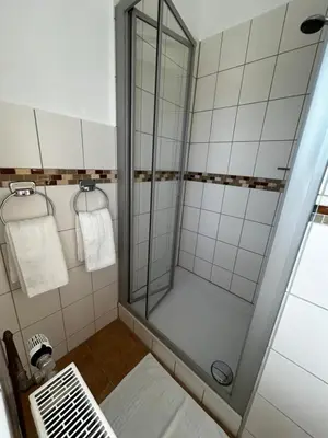Ein Badezimmer in der Unterkunft Hotel Rheinblick