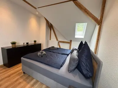Ein Bett oder Betten in einem Zimmer der Unterkunft Heaven Estates Apartments Traben-Trarbach