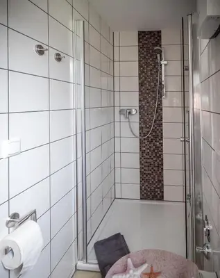 Ein Badezimmer in der Unterkunft FeWo-tt