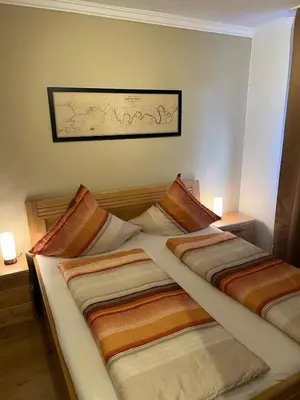 Ein Bett oder Betten in einem Zimmer der Unterkunft Weingut Lindenhof