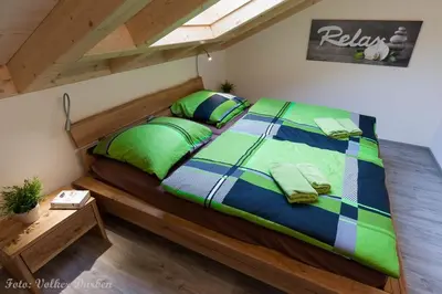 Ein Bett oder Betten in einem Zimmer der Unterkunft Ferienhaus Jonas
