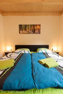 Ein Bett oder Betten in einem Zimmer der Unterkunft Ferienhaus Jonas