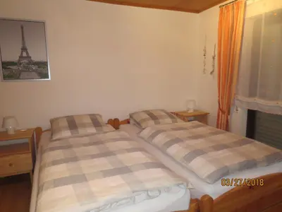 Ein Bett oder Betten in einem Zimmer der Unterkunft Ferienwohnung Hildenbrand