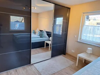 Ein Bett oder Betten in einem Zimmer der Unterkunft Neue Ferienwohnung auf dem Land