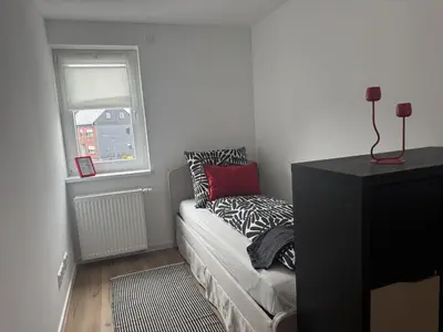 Ein Bett oder Betten in einem Zimmer der Unterkunft Ferienwohnung Bea