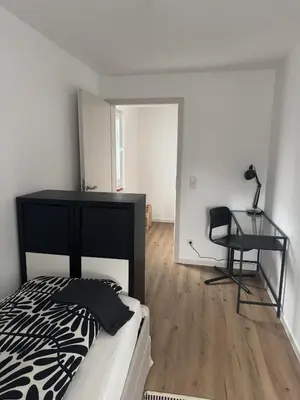 Ein Bett oder Betten in einem Zimmer der Unterkunft Ferienwohnung Bea