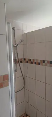Ein Badezimmer in der Unterkunft Loreley 2 Zimmerwohnung mit Hof und Garten