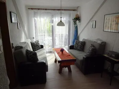 Ein Sitzbereich in der Unterkunft Ferienwohnungen Stollhof