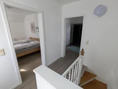 Ein Bett oder Betten in einem Zimmer der Unterkunft Mendiger Basalthaus