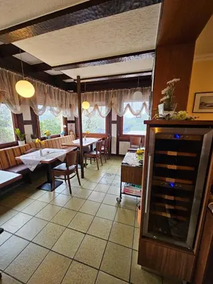 Ein Restaurant oder anderes Speiselokal in der Unterkunft Ferienwohnung Michael Schneider