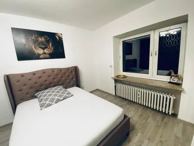 Ein Bett oder Betten in einem Zimmer der Unterkunft Ferienwohnung Hohensonne