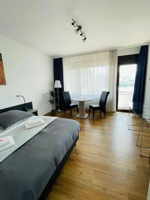 Ein Bett oder Betten in einem Zimmer der Unterkunft Apartment am Deutschen Eck