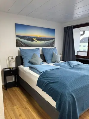 Ein Bett oder Betten in einem Zimmer der Unterkunft Rhine & Wine Apartment