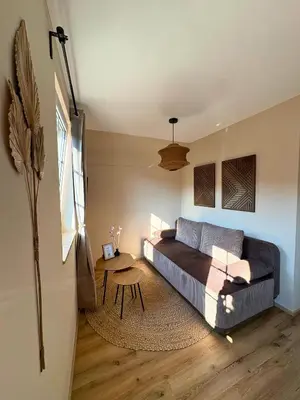Ein Sitzbereich in der Unterkunft Apartment Ikigai