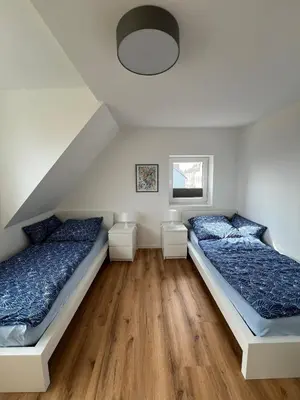 Ein Bett oder Betten in einem Zimmer der Unterkunft Haus mit Aussicht