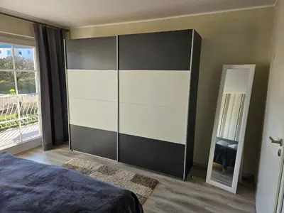 Ein Bett oder Betten in einem Zimmer der Unterkunft Ferienwohnung Saarglück