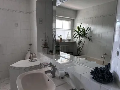 Ein Badezimmer in der Unterkunft Ferienwohnung Saarglück