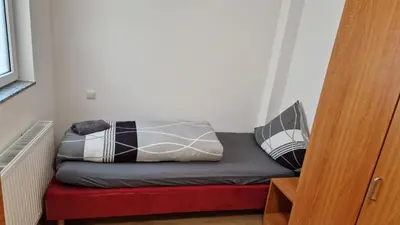 Ein Bett oder Betten in einem Zimmer der Unterkunft Ruhiges Stadthaus in Bingen am Rhein