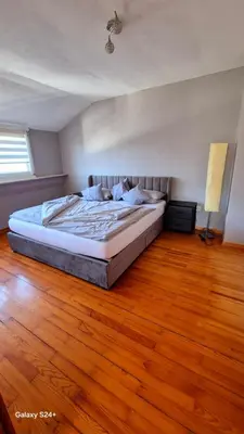 Ein Bett oder Betten in einem Zimmer der Unterkunft Ferienwohnung Moselblick