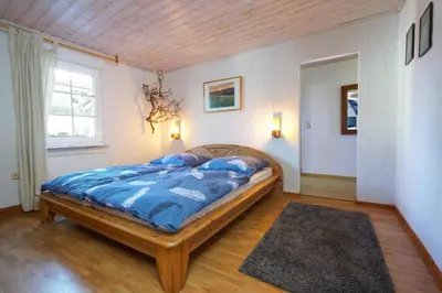 Ein Bett oder Betten in einem Zimmer der Unterkunft FeWo 58